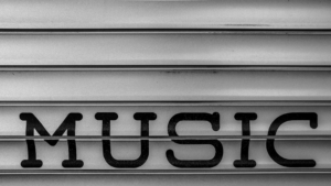 a close up of the word music written in black and white — Foto por Kind and Curious na Unsplash