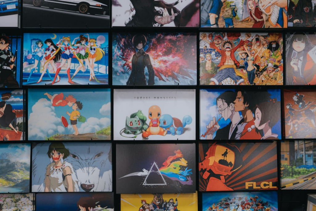 anime character collage photo on black wooden shelf — Foto por Dex Ezekiel na Unsplash